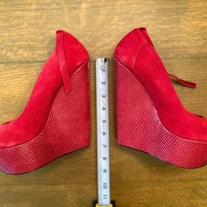 Stunning g red 6.5 heels. Leather upper. Leather covered heels. Size 10